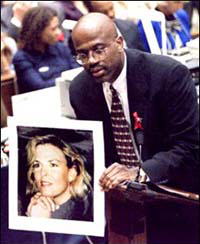 Prosecutor Darden with photo of Nicole Simpson